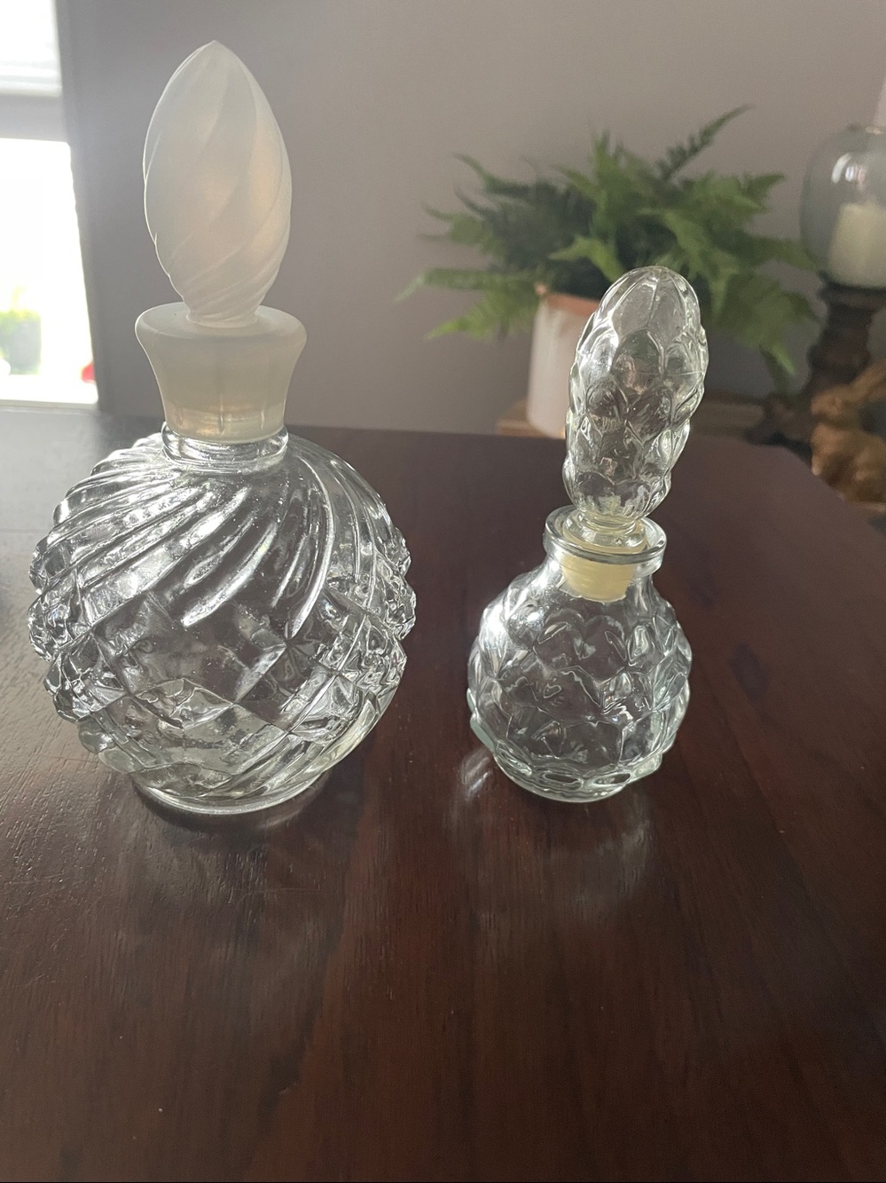 Set of 2 perfume bottles one is Avon Vintage Style Clear Glass Bottle